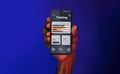 Training App. Black Male Hand Holding Smartphone With Sport Activity Tracker Application Royalty Free Stock Photo