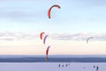 Training of athletes kiting skiing on the snow surface of the large Onega Lake in Karelia.