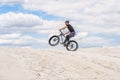 Training a bicyclist in a chalky quarry. A brutal man on a fat bike.