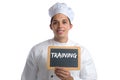 Training cook apprentice trainee cooking job young isolated Royalty Free Stock Photo