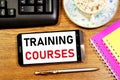 Training courses. Text message on the smartphone screen. Royalty Free Stock Photo