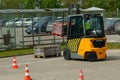 Training employees to operate a forklift on an equipped site.