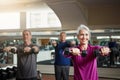 Training, fitness or senior people with dumbbells at gym for club exercise, wellness or cardio, health or strength Royalty Free Stock Photo