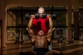 Training in gym where partner gives encouragement Royalty Free Stock Photo