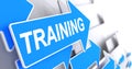 Training - Label on Blue Arrow. 3D. Royalty Free Stock Photo