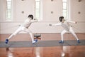 Training, people and fight in fencing competition, duel or combat with martial arts fighter and athlete with a sword and Royalty Free Stock Photo