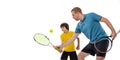 Training. Professional tennis player, coach teaches teen to play tennis isolated over white studio background. Concept Royalty Free Stock Photo