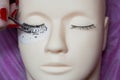 Training a young master to build eyelashes on a silicone mannequin. Work with tweezers, volume shaping, correction, care and remov