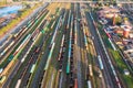 Trains from above. Aerial Top view to railway cylindrical tank shipping containers Rail way. Striped creative transport industry