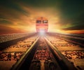 Trains on junction of railways track in trains station agains be Royalty Free Stock Photo