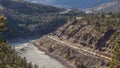 Trains Laboring through the Fraser Canyon in Britsh Columbia