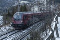 Trains on mountains railway in winter morning near Semmering Austria 01 13 2024 Royalty Free Stock Photo