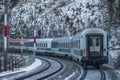 Trains on mountains railway in winter morning near Semmering Austria 01 13 2024 Royalty Free Stock Photo