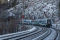 Trains on mountains railway in winter morning near Semmering Austria 01 13 2024 Royalty Free Stock Photo