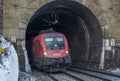 Trains on mountains railway in winter morning near Semmering Austria 01 13 2024