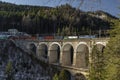 Trains on mountains railway in winter morning near Semmering Austria 01 13 2024 Royalty Free Stock Photo