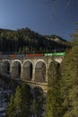 Trains on mountains railway in winter morning near Semmering Austria 01 13 2024 Royalty Free Stock Photo