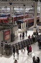 Trains and passengers at a London station Royalty Free Stock Photo