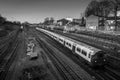 Trains passing on railroad tracks seen from above, London UK.