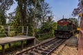 Trains passing at the station at Yatiwaldeniya on the Kandy to Colombo main line railway in Sri Lanka, Asia Royalty Free Stock Photo