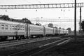 Trains on the railroad. The power line from above is rhythmically repeated.