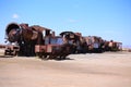 Trains in ruins abandoned in the middle of the desert. Cemetery of trains in Bolivia.