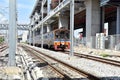 The Trains running on the train tracks to the station in Thailand