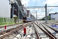 The Trains running on the train tracks to the station in Thailand