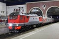 Trains at the train station waiting for passengers to board. Travel by rail on vacation