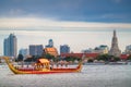 Traitional royal thai boat in river in Bangkok city with Wat arun temple background Royalty Free Stock Photo