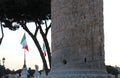 Trajan column and the waving Italian flag in the center of Rome