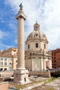 Trajan s column and church Santa Maria di Loreto, Rome Royalty Free Stock Photo