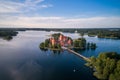 Trakai Castle with lake and forest in background.  Lithuania Royalty Free Stock Photo