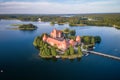 Trakai Castle with lake and forest in background.  Lithuania Royalty Free Stock Photo