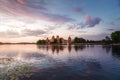 Trakai Castle and Lake Galve at sunset - Trakai, Lithuania Royalty Free Stock Photo