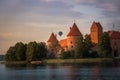 Trakai Castle at sunset with Hot-air Balloon - Trakai, Lithuania Royalty Free Stock Photo