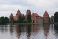 Trakai island castle at the lake. Reflection in water. Royalty Free Stock Photo