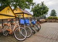 Trakai, Lithuania - August 15, 2017: Colorful and bright bicycles at parkinkg, available for rent. Public transportation concept.