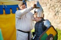 TRAKAI, LITHUANIA - JUNE 16, 2018: Historical reenactment activists wearing medieval costumes during annual Medieval Festival,