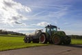 traktor bringing out liquid manure