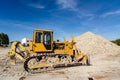 Traktor on the mine of white clay Royalty Free Stock Photo