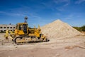 Traktor on the mine of white clay Royalty Free Stock Photo