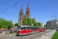 Tram and Ancient Twin Spired Church, Prague, Czech Republic.