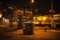 Tram with blur light moving on night canals of Amsterdam.