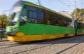 Tram blurred by motion, abstract photo, public transportation in Poznan, Poland. Royalty Free Stock Photo