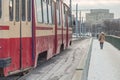 Tram on a bridge in winter