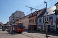 Tram car traveling on a clear shopping street in Bratislava, Slovakia