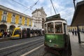 A tram in the Comercio Square Praca do Comercio with the Augusta Street Arch on the background, in the city of Lisbon