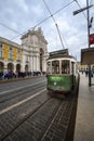 Tram in the Comercio Square Praca do Comercio with the Augusta Street Arch on the background, in the city of Lisbon