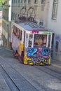 Tram decorated with graffiti. Lisbon